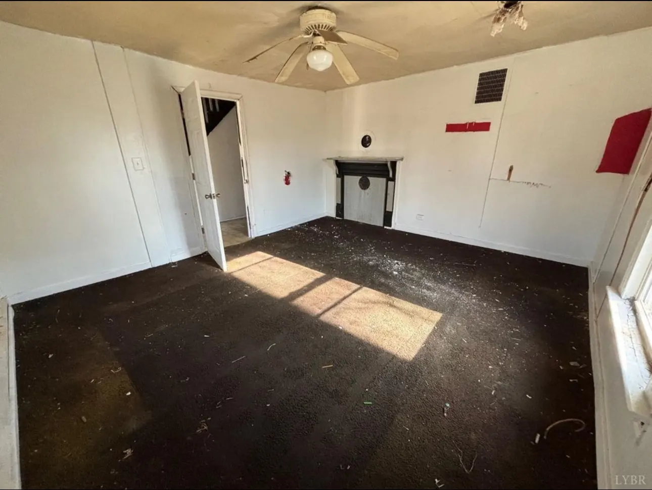 Main living area at Garfield Avenue before renovation