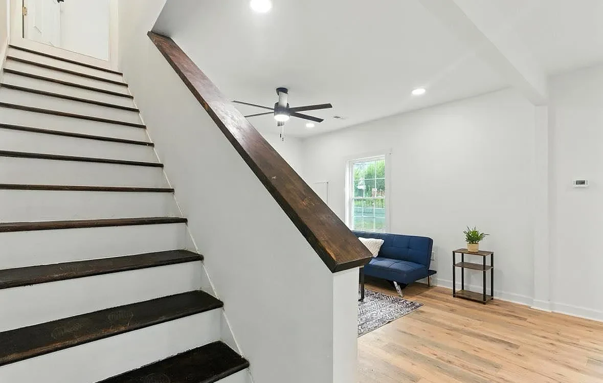 Completed Bransford Street staircase with dark treads and white risers