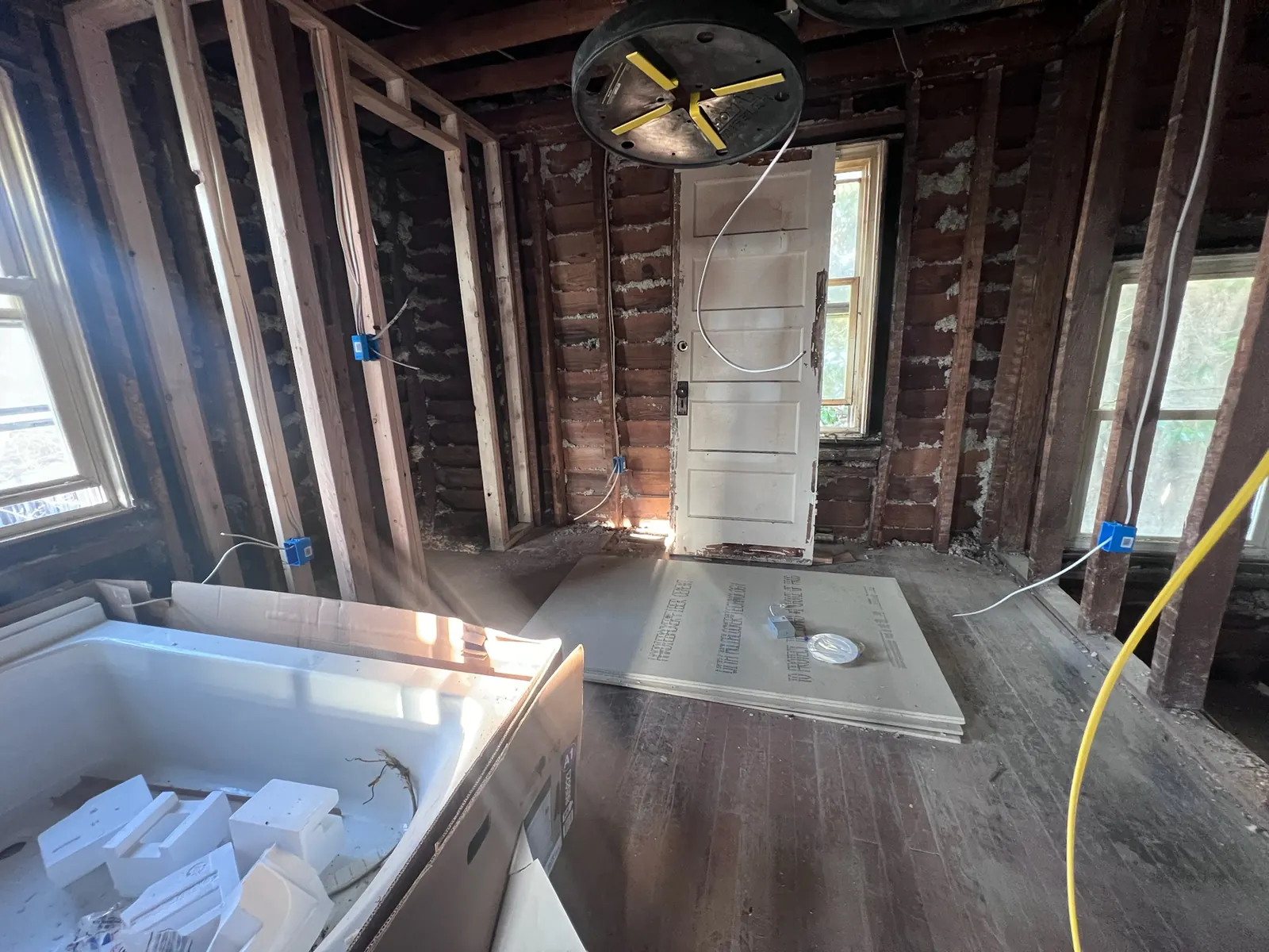 Bathroom at Lynchburg Avenue with exposed framing during demolition