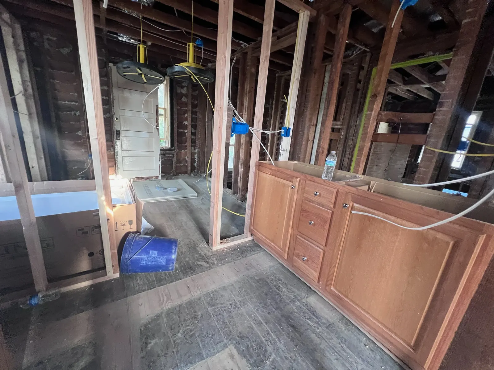 Kitchen stripped to wall studs during the Lynchburg Avenue renovation
