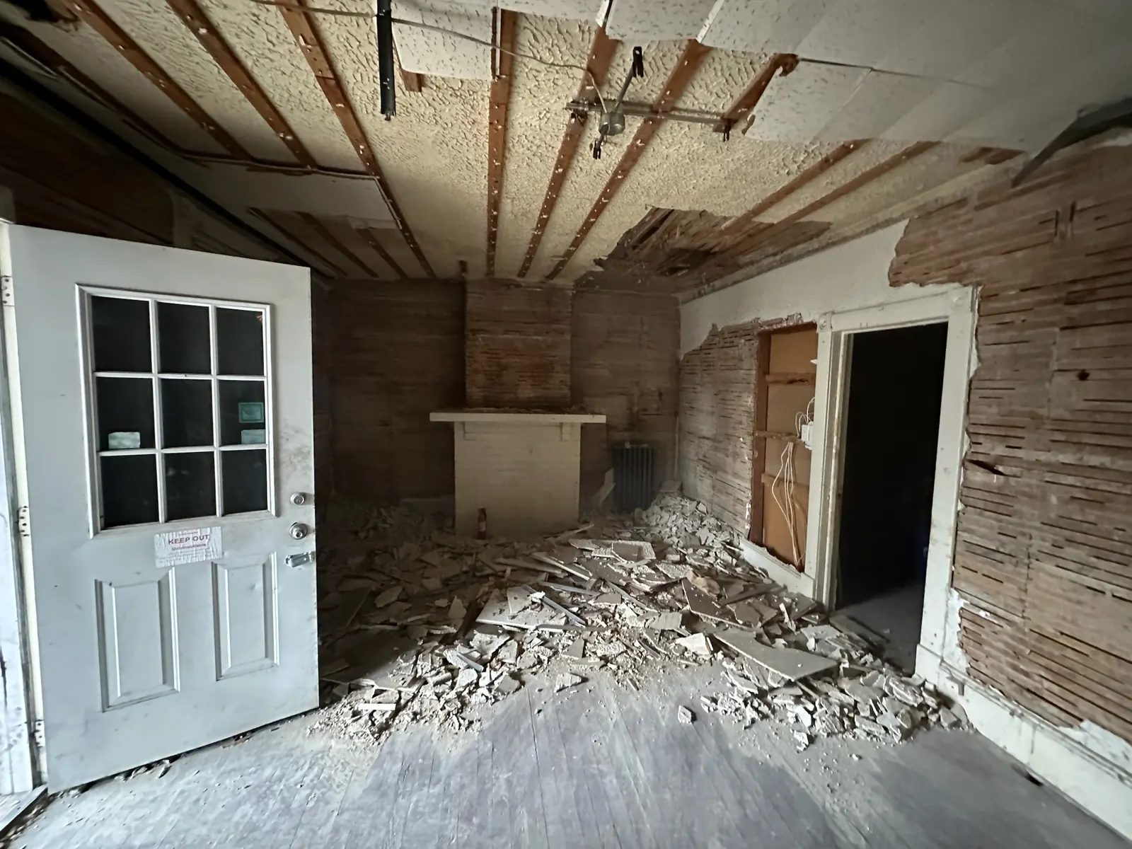 Lynchburg Avenue main living area stripped to lath during demolition